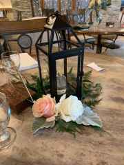 Black-Lantern-with-Floral-Centerpiece
